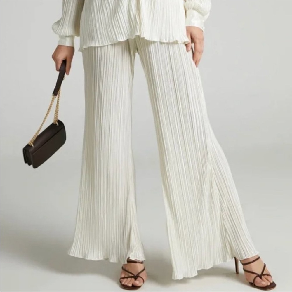 Showpo Becca Plise Flared Pants in Cream